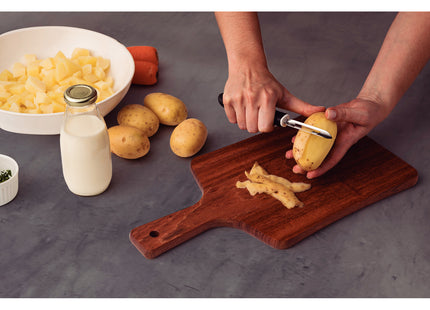 Pelador de Papas Manual Tramontina Utilità en Acero Inoxidable con Mango de Polipropileno Negro