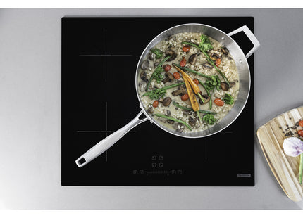 Sartén Tramontina Grano de acero inoxidable con cuerpo triple con tapa y mango 30 cm 5.6 L